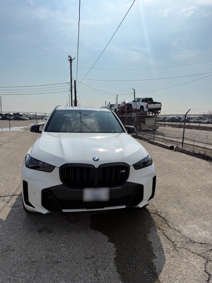 BMW photographed from the front during terminal check-in