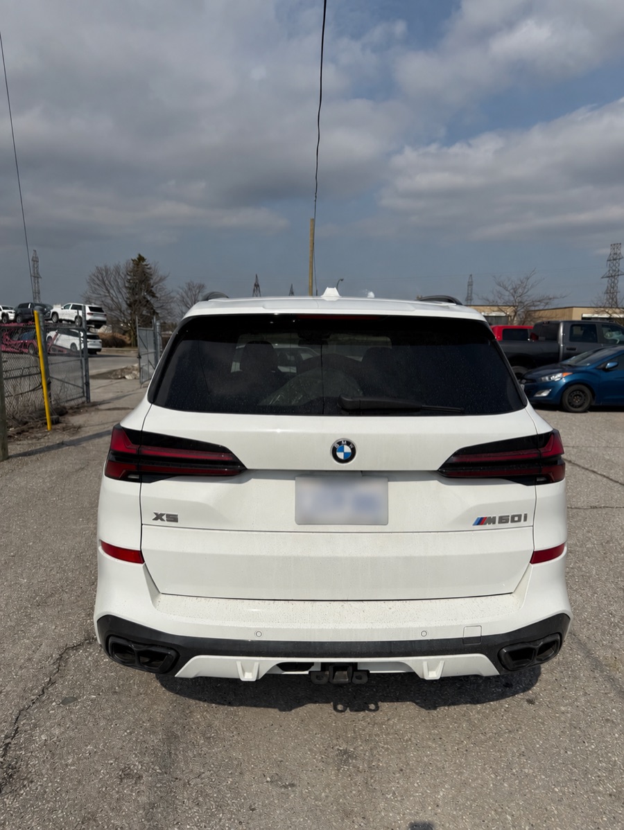 BMW photographed from the rear during terminal check-in